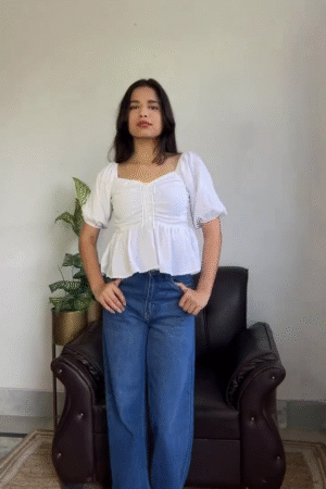 Women’s White Peplum Top with Blue Wide-Leg Jeans – Casual Chic Outfit