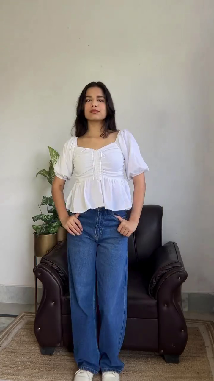 Women’s White Peplum Top with Blue Wide-Leg Jeans – Casual Chic Outfit