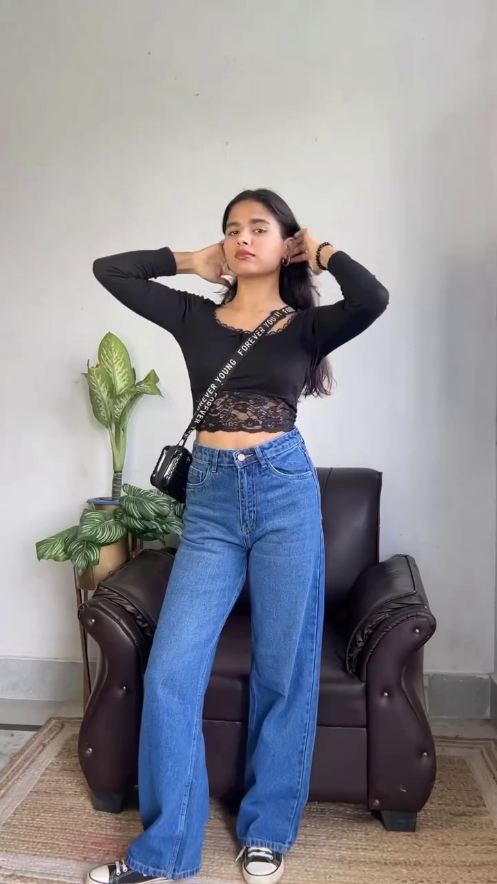 Women’s White Peplum Top with Blue Wide-Leg Jeans – Casual Chic Outfit - Image 3