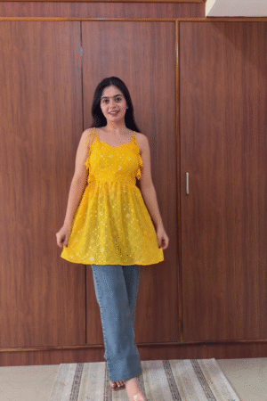 Yellow Embroidered Babydoll Top with Blue Jeans – Bright Casual Summer Outfit for Women