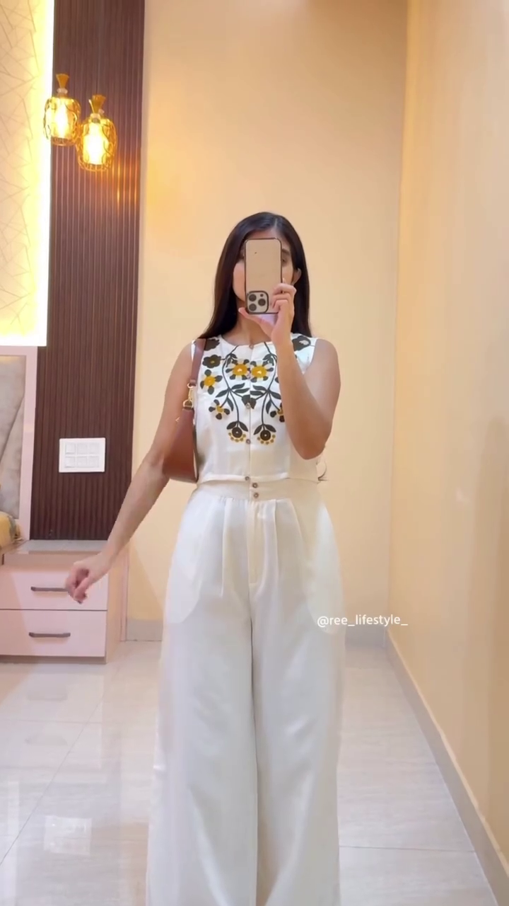 Trendy White Co-Ord Set with Black Prints | Stylish Sleeveless Top & Wide-Leg Pants for Women - Image 2